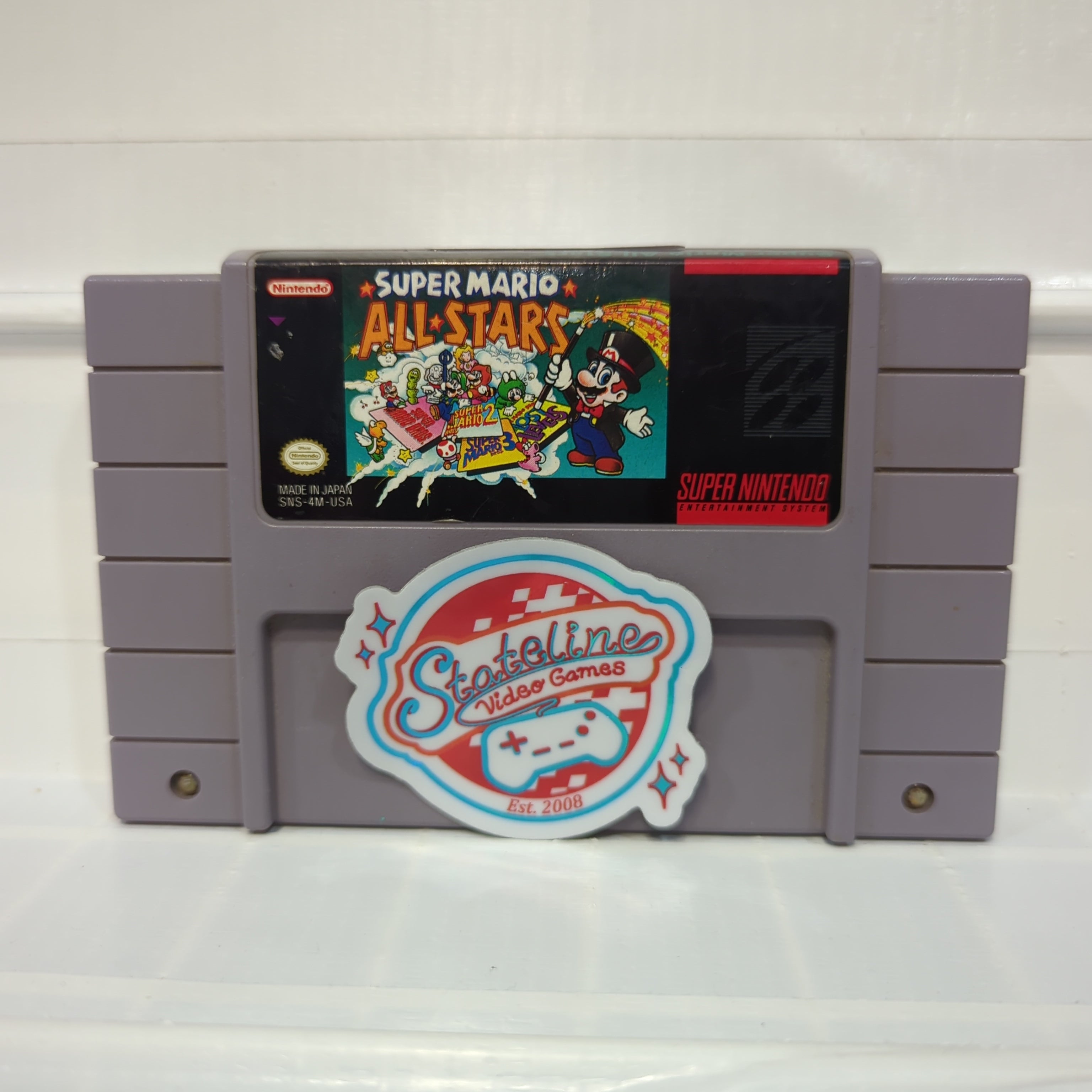 Store Super Nintendo in Gray with 2 games