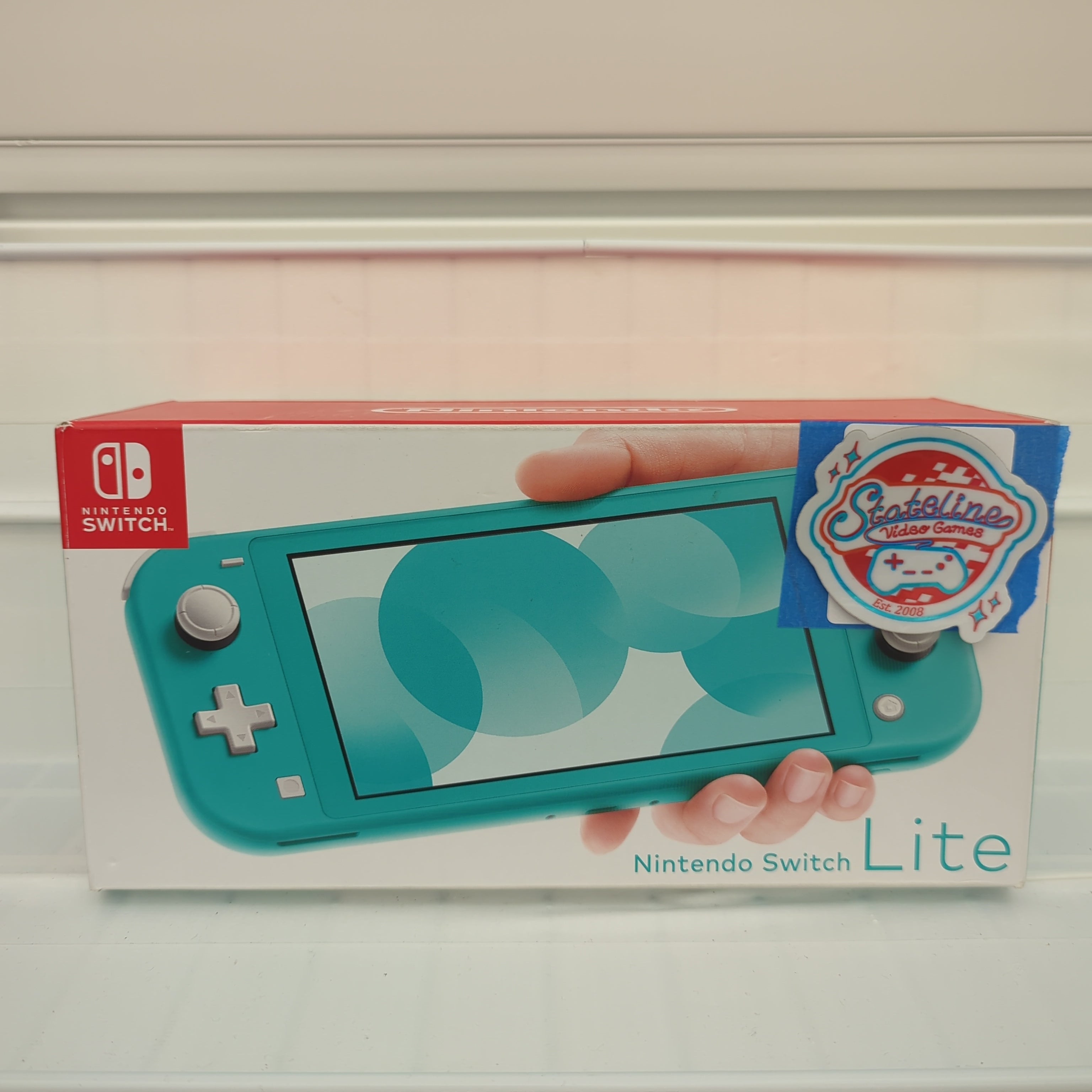 New in box deals Nintendo Switch Lite in Turquoise