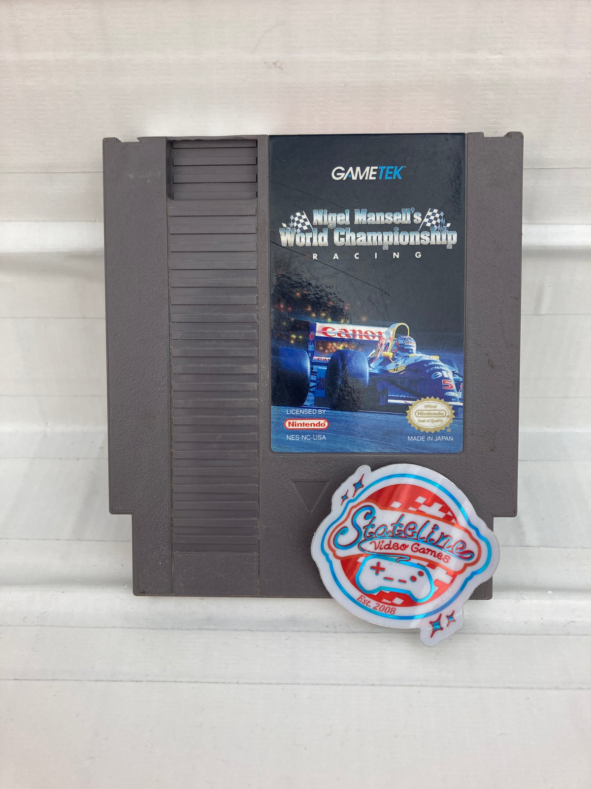 Nigel Mansell's World Championship Racing - NES